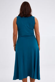 Model Monique wearing size 14 of The Summer Fit & Flare Tank Dress in colour Oceanblue (Blue), from the back