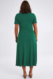 Model Monique wearing size 14 of The Summer Fit & Flare S/S Dress in colour Seagreen (Green), from the back
