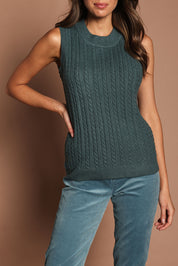 Model Madeline wearing size S of The Soft Sleeveless Cable Knit Jumper in colour Bluegrass (Blue), from the front, cropped image