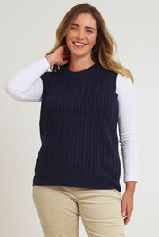 Model Chanel wearing size XL of The Soft Sleeveless Cable Knit Jumper in colour Richnavy (Blue), from the front, cropped image