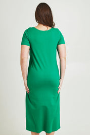 Model Jane wearing size 14 of The Short Sleeve Tie Waist Dress in colour Emerald (Green), from the back