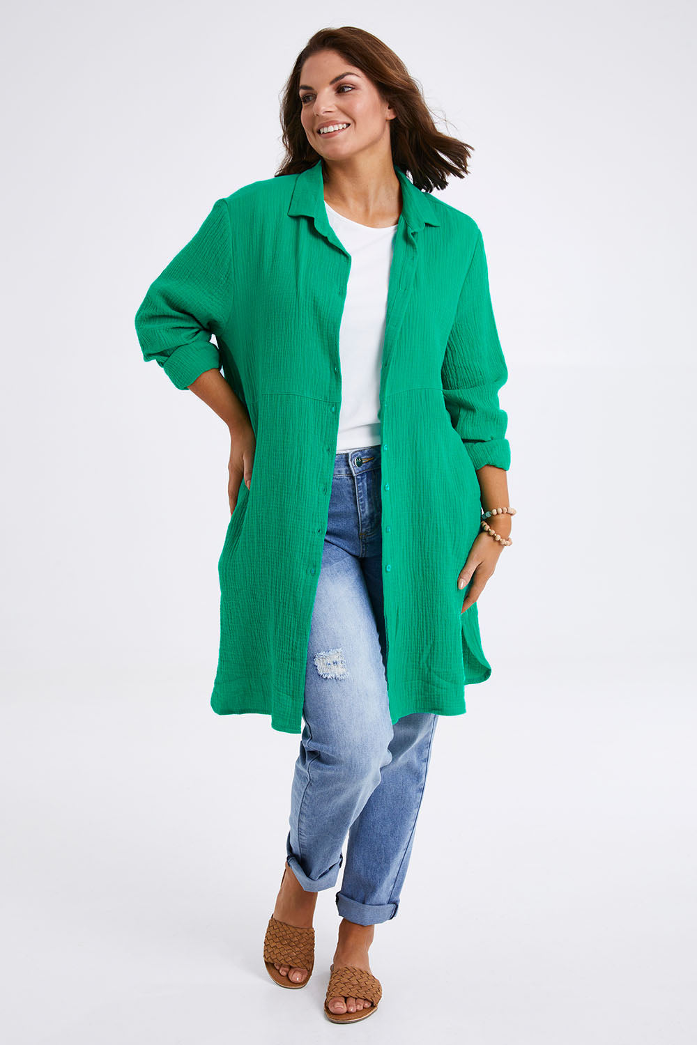 Model Monique wearing size 14 of The Double Cotton Long Overshirt in colour Emerald (Green), from the front, showing the whole outfit
