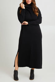 Model Laura wearing size L of The Roll Neck Knit Maxi Dress in colour Black (Black), from the front, cropped image