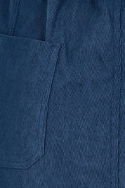Product shot of the The Everyday Cord Cargo Pant – Navy in colour Navy, showing detail