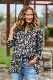 Model Emma wearing size 10 of The Easy Wear Cotton Shirt in colour Navytaupe (Blue), from the front, showing the whole outfit