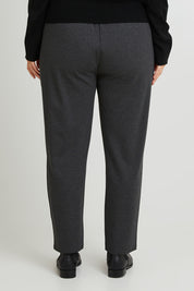Model Laura wearing size 14 of The Easy Wear Ponte Pant in colour Charcoal (Grey), from the back