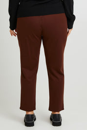 Model Laura wearing size 14 of The Easy Wear Ponte Pant in colour Chocolate, from the back