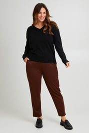 Model Laura wearing size 14 of The Easy Wear Ponte Pant in colour Chocolate, from the front, showing the whole outfit