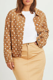 Model Monique wearing size 14 of The Keepers Printed Cord Jacket in colour Camel, from the front, cropped image