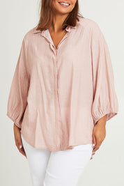 Model Monique wearing size 14 of The Keepers Soft Relaxed Fit Shirt in colour Dustypink (Pink), from the front, cropped image