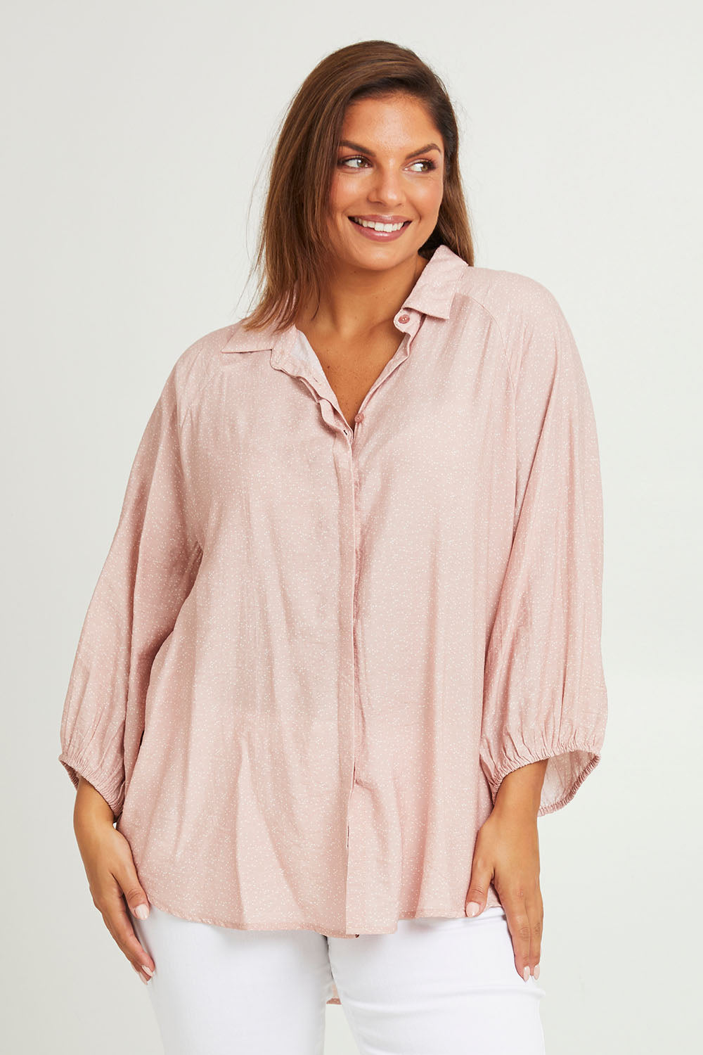 Model Monique wearing size 14 of The Keepers Soft Relaxed Fit Shirt in colour Dustypink (Pink), from the front, cropped image