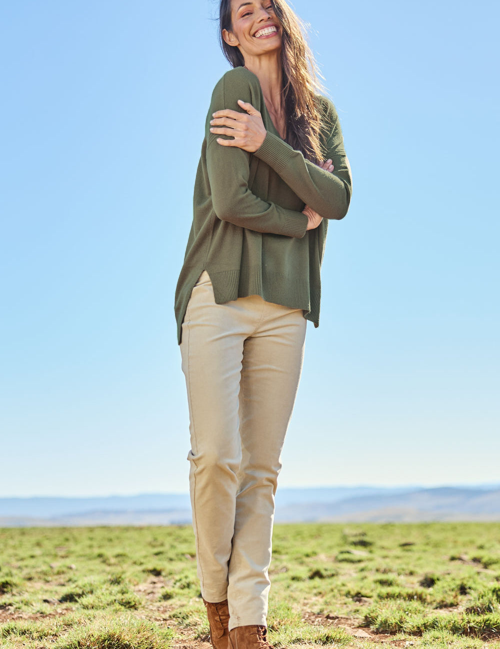 Model Amanda wearing size 10 of The Keepers Cord Pull On Pant in colour Almond, from the front, showing the whole outfit