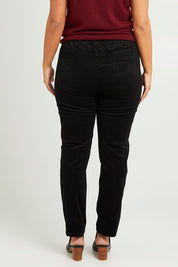 Model Monique wearing size 14 of The Keepers Cord Pull On Pant in colour Black (Black), from the back