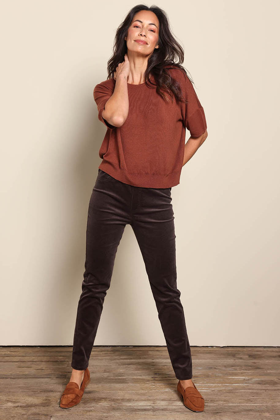 Model Amandam wearing size 10 of the The Keepers Cord Pull On Pant – Darkcocoa in colour Darkcocoa, from the front