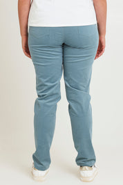 Model Chanel wearing size 16 of The Keepers Cord Pull On Pant in colour Denim (Blue), from the back