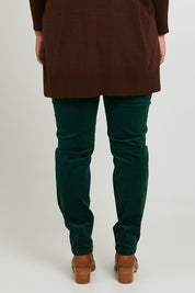 Model Monique wearing size 14 of The Keepers Cord Pull On Pant in colour Forest (Green), from the back