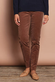 Model Amanda wearing size 10 of The Keepers Cord Pull On Pant in colour Mushroom, from the front, cropped image