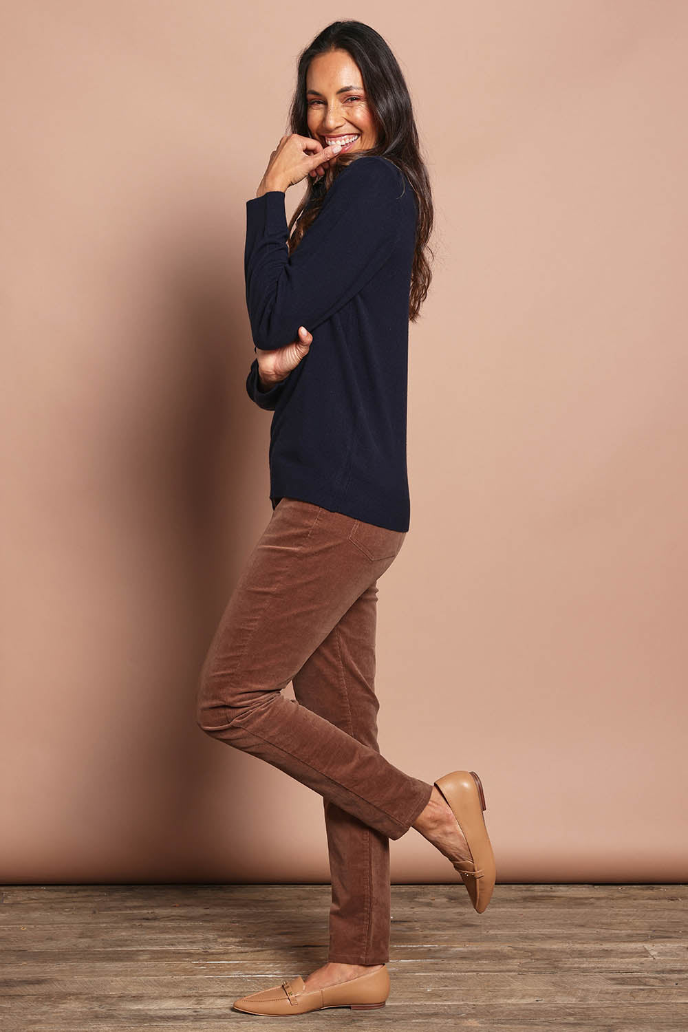 Model Amanda wearing size 10 of The Keepers Cord Pull On Pant in colour Mushroom, from the front, showing the whole outfit