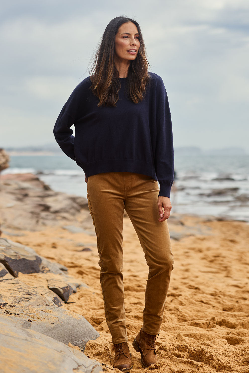 Model Amanda wearing size 10 of The Keepers Cord Pull On Pant in colour Tan, from the front, showing the whole outfit