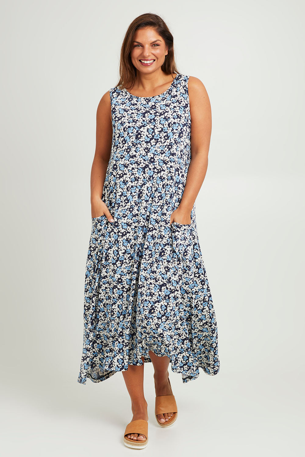 Model Monique wearing size 14 of The Easy Wear Print Maxi Dress in colour Bluefloral (Blue), from the front, showing the whole outfit