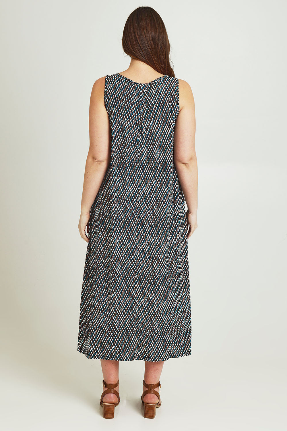 Model Jane wearing size 14 of The Easy Wear Print Maxi Dress in colour Multiprint (Blue), from the back