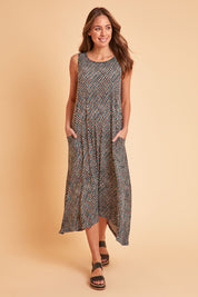 Model Madeline wearing size 10 of The Easy Wear Print Maxi Dress in colour Multiprint (Blue), from the front, showing the whole outfit