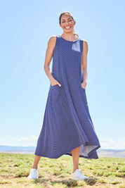 Model Amanda wearing size 10 of The Easy Wear Print Maxi Dress in colour Navydot (Blue), from the front, showing the whole outfit
