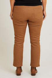 Model Laura wearing size 14 of The 7/8 Pull On Coloured Jean in colour Tobacco, from the back