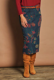 Model Madeline wearing size 10 of The 5 Pocket Printed Midi Skirt in colour Redfloral (Blue), from the front, cropped image