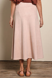 Model Amandam wearing size 10 of the The Luxe Faux Suede Skirt – Baci in colour Baci, from the back