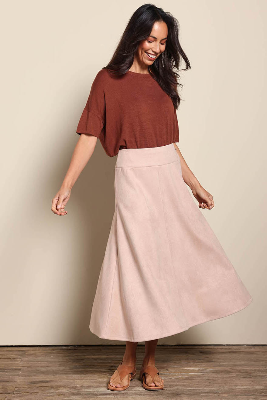 Model Amandam wearing size 10 of the The Luxe Faux Suede Skirt – Baci in colour Baci, from the front