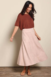 Model Amandam wearing size 10 of the The Luxe Faux Suede Skirt – Baci in colour Baci, from the front
