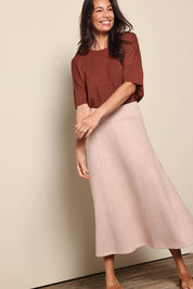 Model Amandam wearing size 10 of the The Luxe Faux Suede Skirt – Baci in colour Baci, from the front