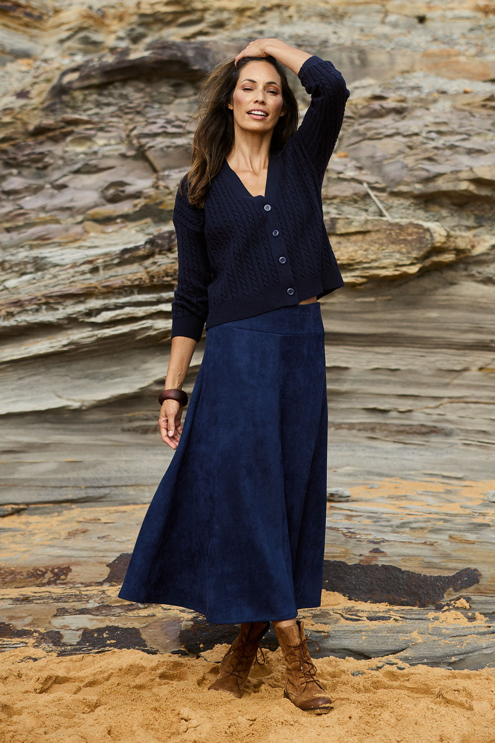 Model Amanda wearing size 10 of The Luxe Faux Suede Skirt in colour Navy (Blue), from the front, showing the whole outfit