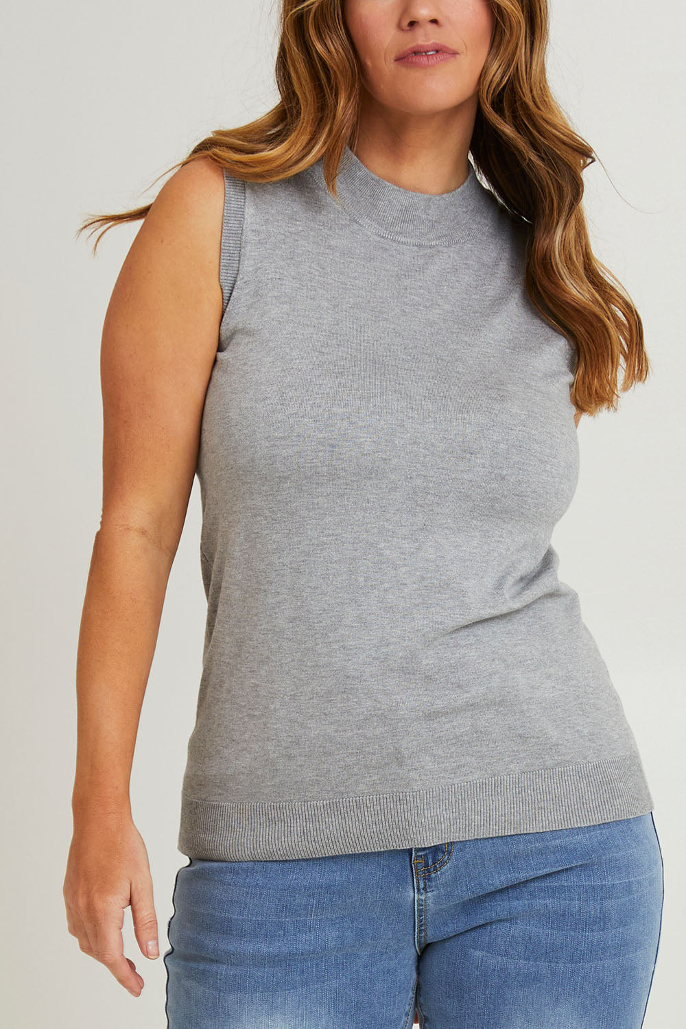 Model Laura wearing size L of The All Season Sleeveless Tank in colour Silvergrey (Grey), from the front, cropped image