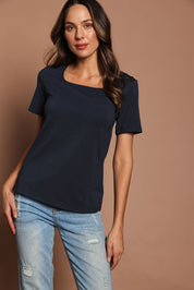 Model Madeline wearing size 10 of The Keepers Square Neck Tee in colour Darknavy (Blue), from the front, cropped image