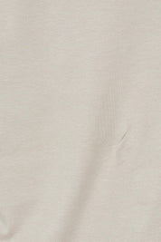 Product shot of The Keepers Square Neck Tee in colour Latte, detail