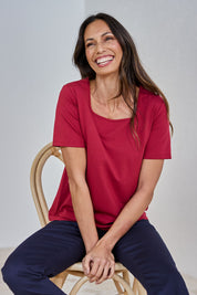 Model Amanda wearing size 10 of The Keepers Square Neck Tee in colour Rose (Pink), from the front, showing the whole outfit