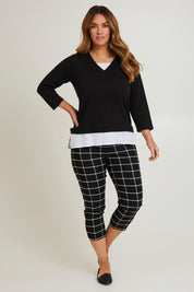 Model Laura wearing size 14 of The Keepers Layered Tee in colour Black (Black), from the front, showing the whole outfit