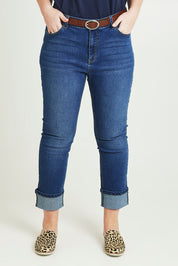 Model Jane wearing size 14 of The High Waisted Cuff Jean in colour Mediumblue (Blue), from the front, cropped image