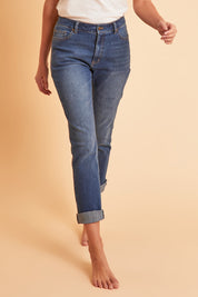 Model Madeline wearing size 10 of The High Waisted Cuff Jean in colour Mediumblue (Blue), from the front, showing the whole outfit