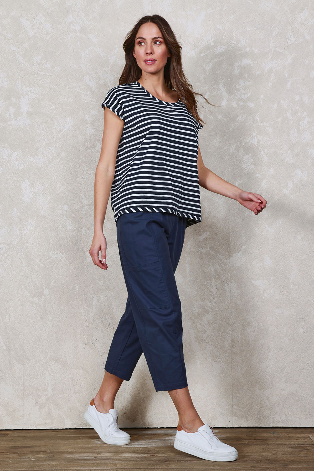 Model Madeline wearing size 10 of The Keepers Side Pocket Pant in colour Oceanblue (Blue), from the front, showing the whole outfit