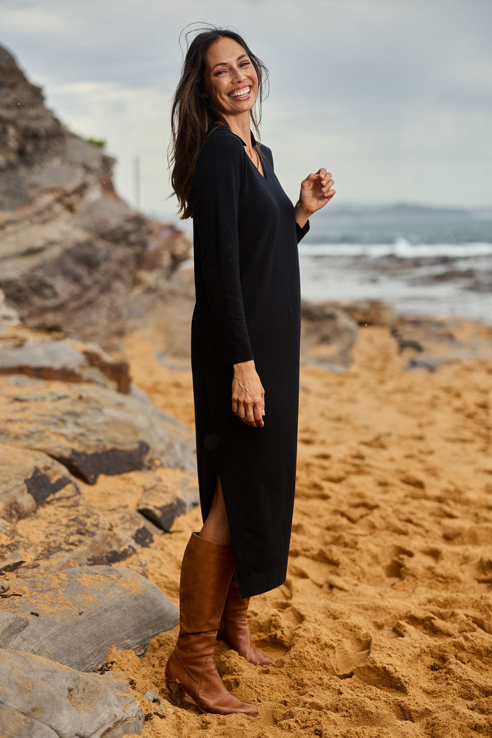 Model Amanda wearing size S of The Comfort True Knit Johnny Collar Dress in colour Black (Black), from the front, showing the whole outfit