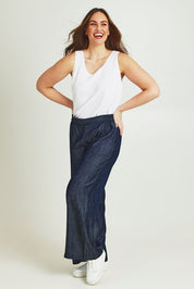 Model Jane wearing size 14 of The Keepers Essential Woven Tank in colour White (White), from the front, showing the whole outfit