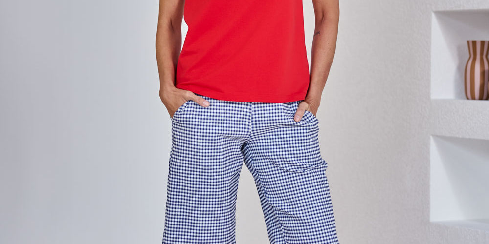 Model Amanda wearing size 10 of The Keepers Check Cotton Short in colour Navywhite (Blue), from the front, showing the whole outfit