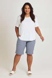 Model Ashleigh wearing size 16 of The Keepers Check Cotton Short in colour Navywhite (Blue), from the front, showing the whole outfit