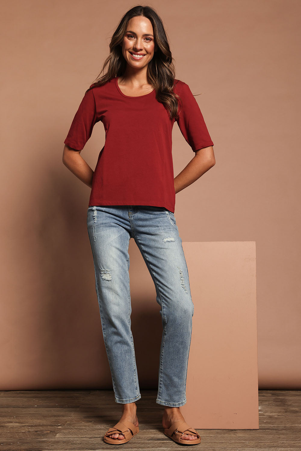 Model Madeline wearing size 10 of The Luxe Pima Cotton Tee in colour Deeprose (Pink), from the front, showing the whole outfit
