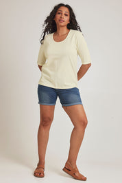 Model Terri-Leigh wearing size 14 of The Luxe Pima Cotton Tee in colour Lemon, from the front, showing the whole outfit