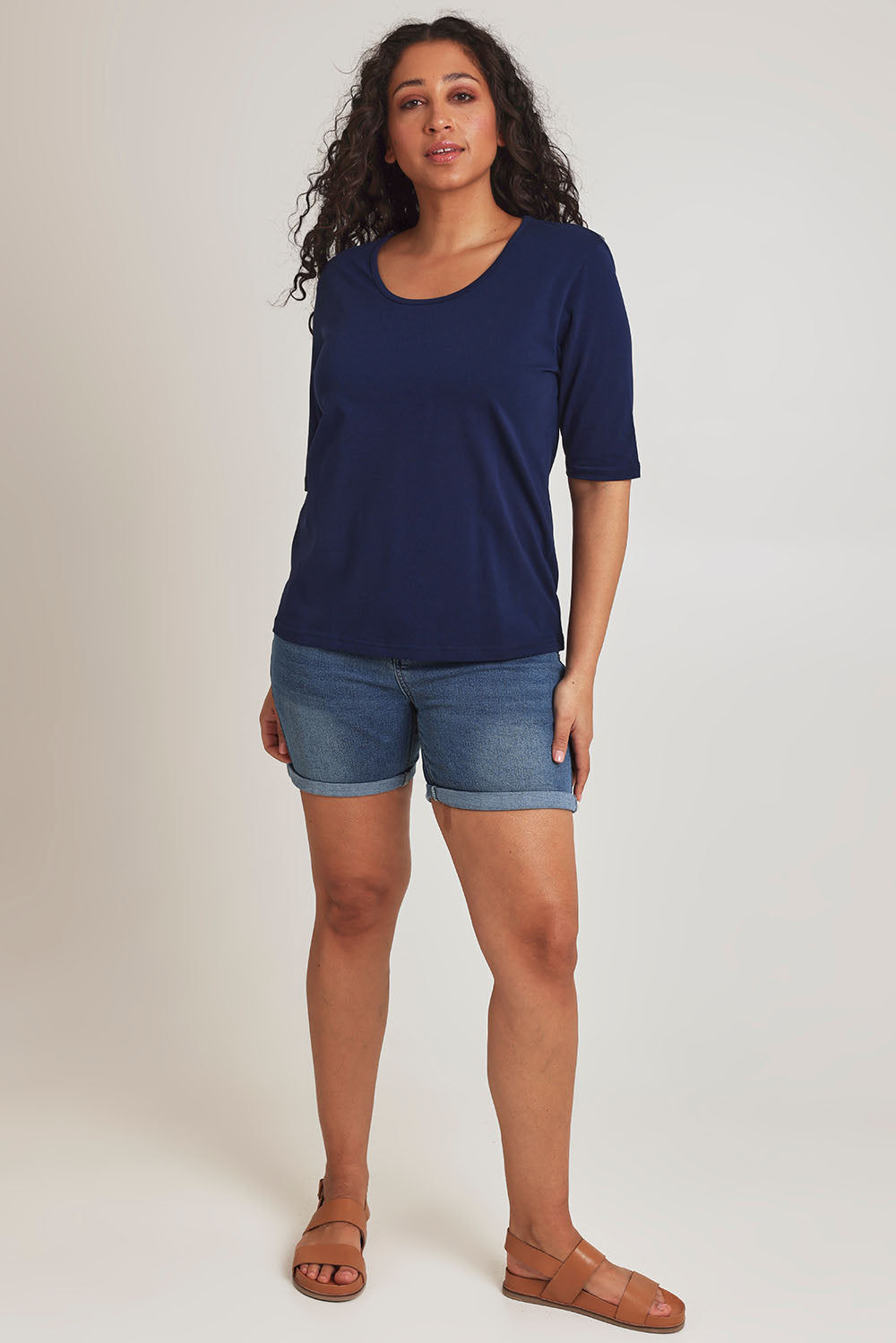 Model Terri-Leigh wearing size 14 of The Luxe Pima Cotton Tee in colour Navy (Blue), from the front, showing the whole outfit
