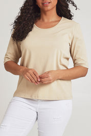 Model Terri-Leigh wearing size 14 of The Luxe Pima Cotton Tee in colour Nougat, from the front, cropped image